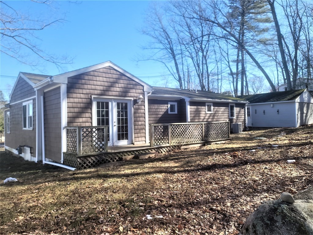 21 Kimball Road Amesbury, MA 01913 - Photo 3 of 23 a front view of a house with a yard