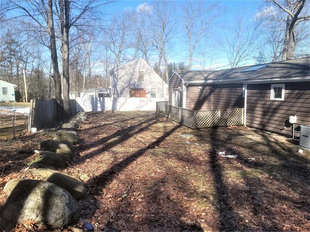 21 Kimball Road Amesbury, MA 01913 - Photo 7 of 23 a view of a backyard with large trees