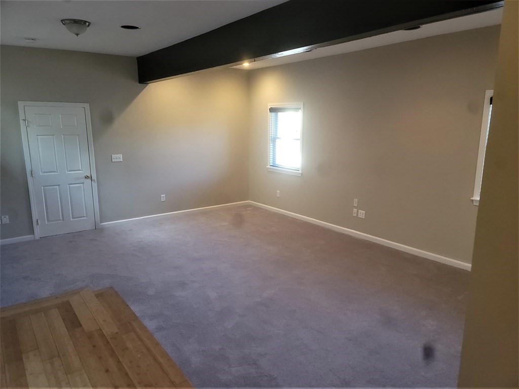 21 Kimball Road Amesbury, MA 01913 - Photo 9 of 23 a view of an empty room with a window