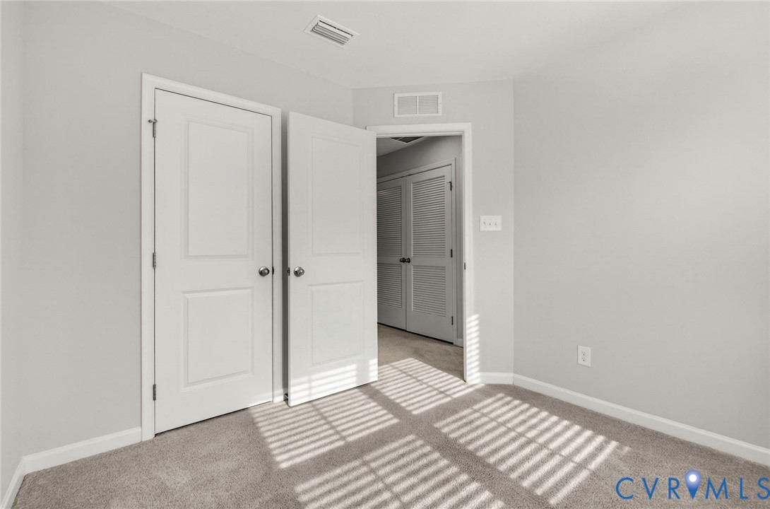 1136 Canterbury Ridge Road Richmond, VA 23224 - Photo 19 of 28 a view of an empty room