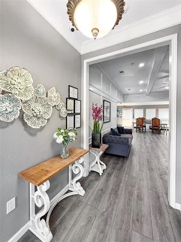 view of hall with wooden floor