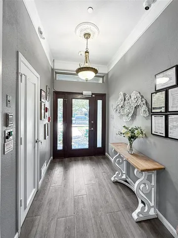 a room with furniture and view of living room
