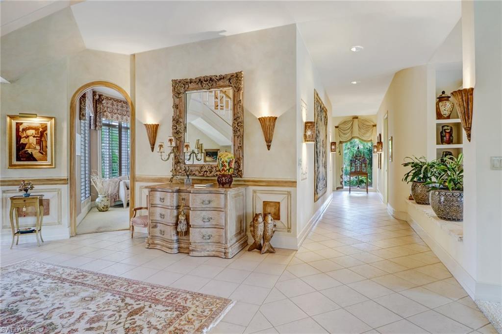 4588 Silver Fox Drive Naples, FL 34119 - Photo 12 of 35 a view of living room filled with furniture and window