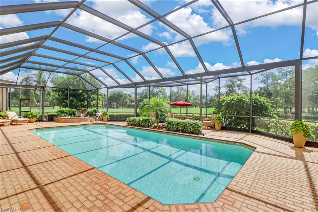 4588 Silver Fox Drive Naples, FL 34119 - Photo 29 of 35 a view of a backyard