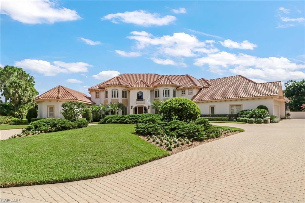 4588 Silver Fox Drive Naples, FL 34119 - Photo 35 of 35 a view of a garden with a house
