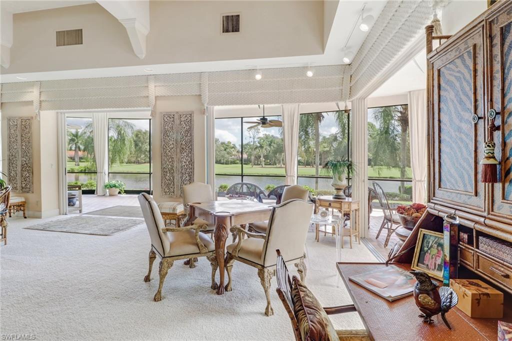 4588 Silver Fox Drive Naples, FL 34119 - Photo 7 of 35 a view of a dining room with furniture window and outside view