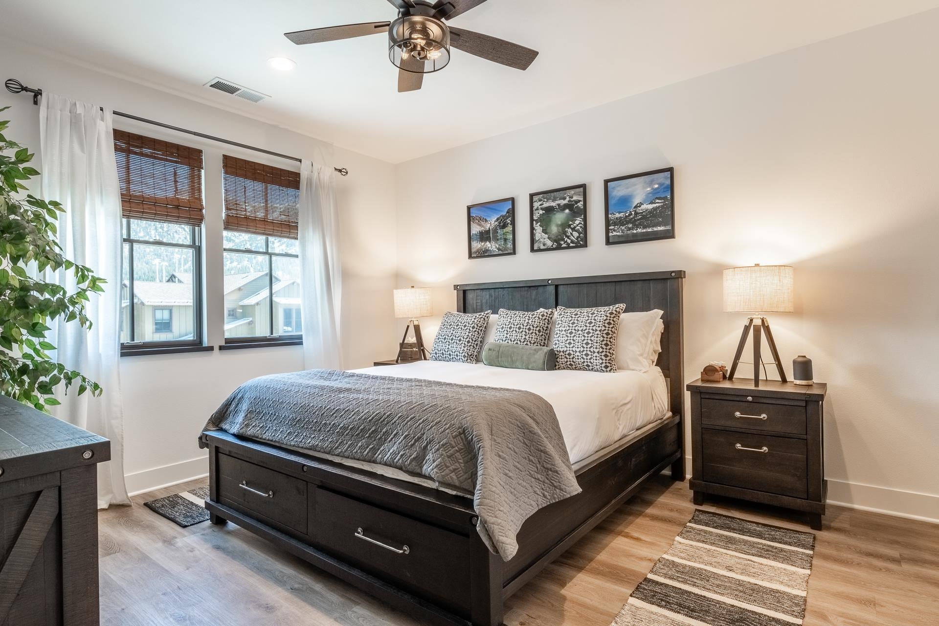 1353 Timber Creek Road, Unit 1353 Mammoth Lakes, CA 93546 - Photo 19 of 50 a bedroom with a bed and a chandelier