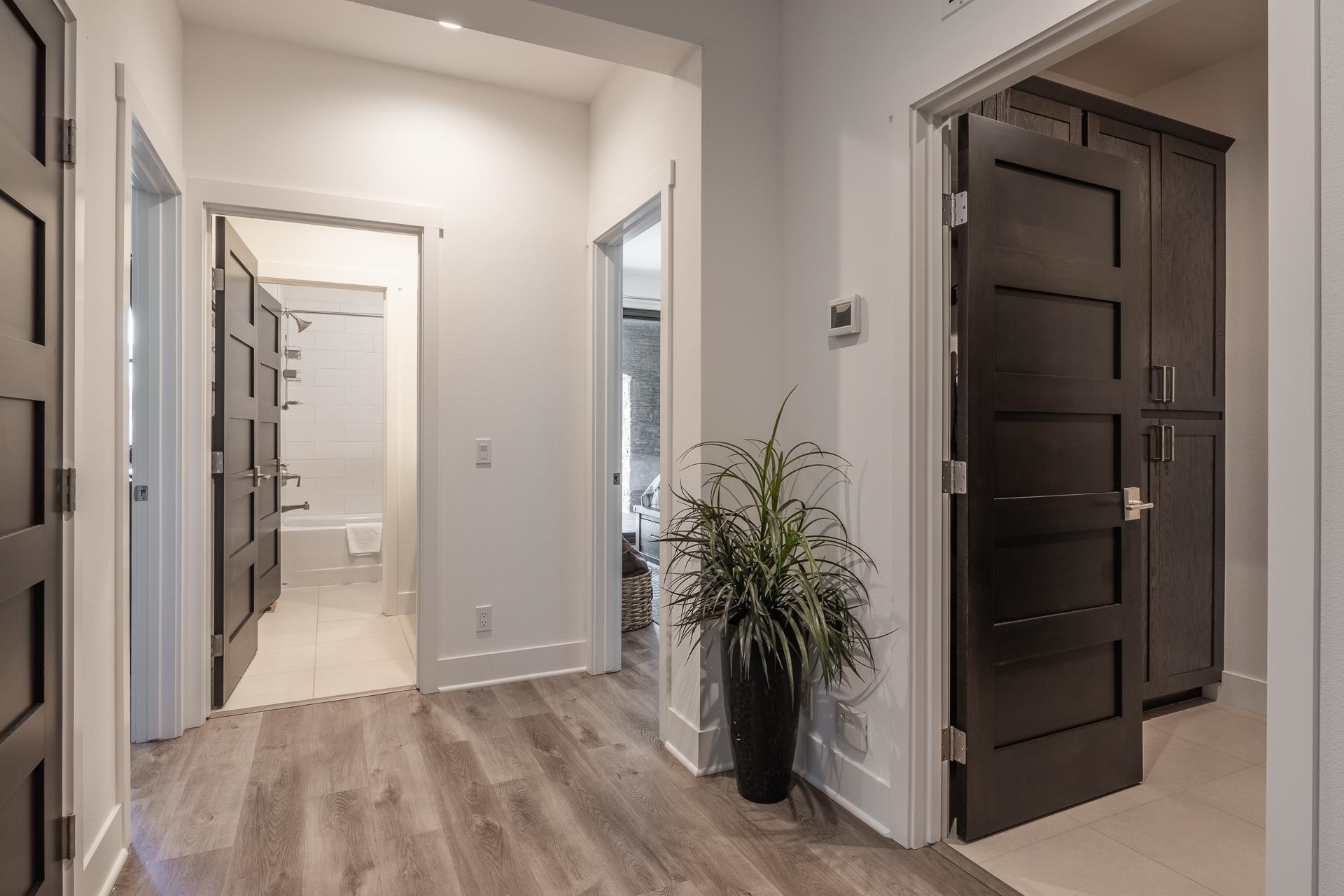1353 Timber Creek Road, Unit 1353 Mammoth Lakes, CA 93546 - Photo 25 of 50 a view of a hallway with wooden floor and a bathroom