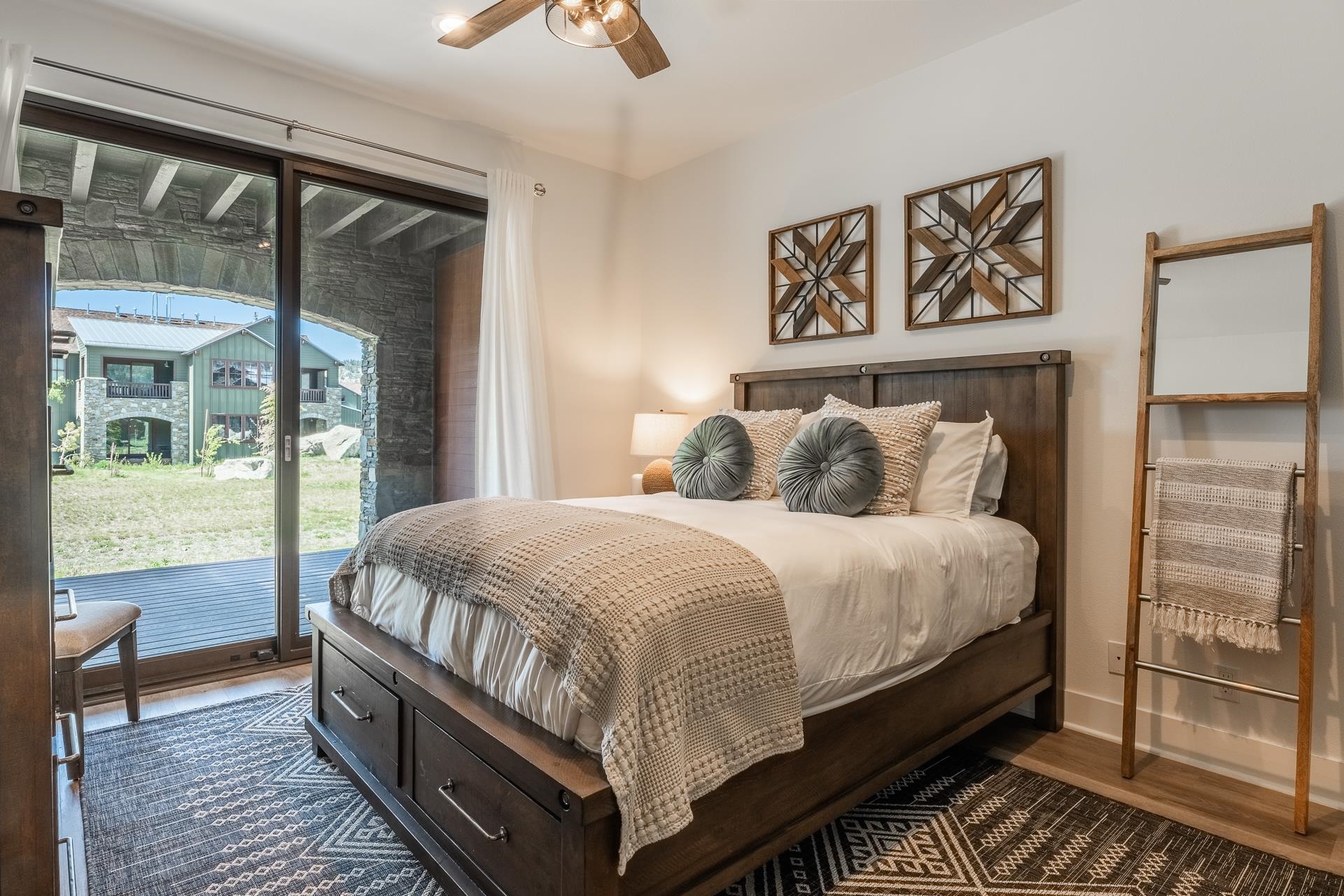 1353 Timber Creek Road, Unit 1353 Mammoth Lakes, CA 93546 - Photo 29 of 50 a bed sitting in a bedroom next to a window