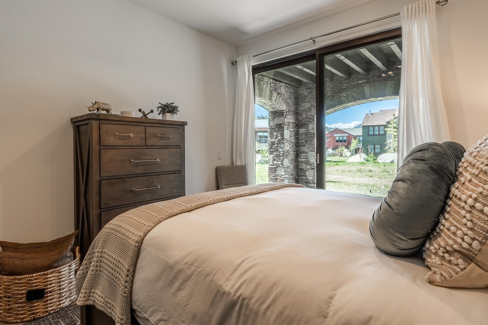 1353 Timber Creek Road, Unit 1353 Mammoth Lakes, CA 93546 - Photo 30 of 50 a bedroom with a bed and wooden floor