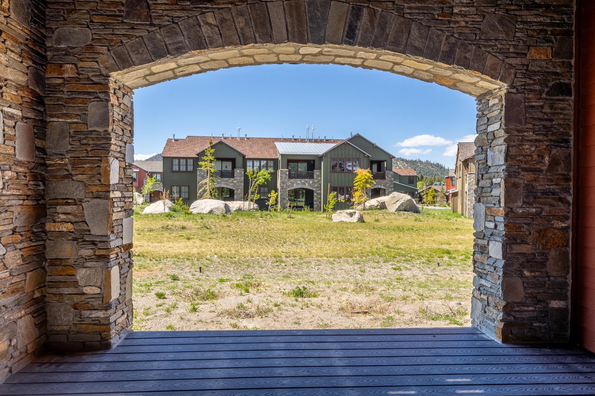 1353 Timber Creek Road, Unit 1353 Mammoth Lakes, CA 93546 - Photo 37 of 50 a view of a building with a yard