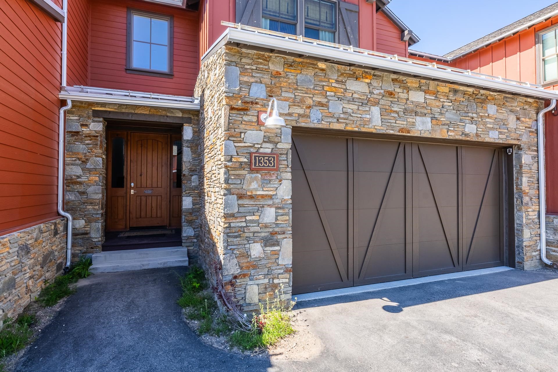1353 Timber Creek Road, Unit 1353 Mammoth Lakes, CA 93546 - Photo 38 of 50 a front view of a house with a garage