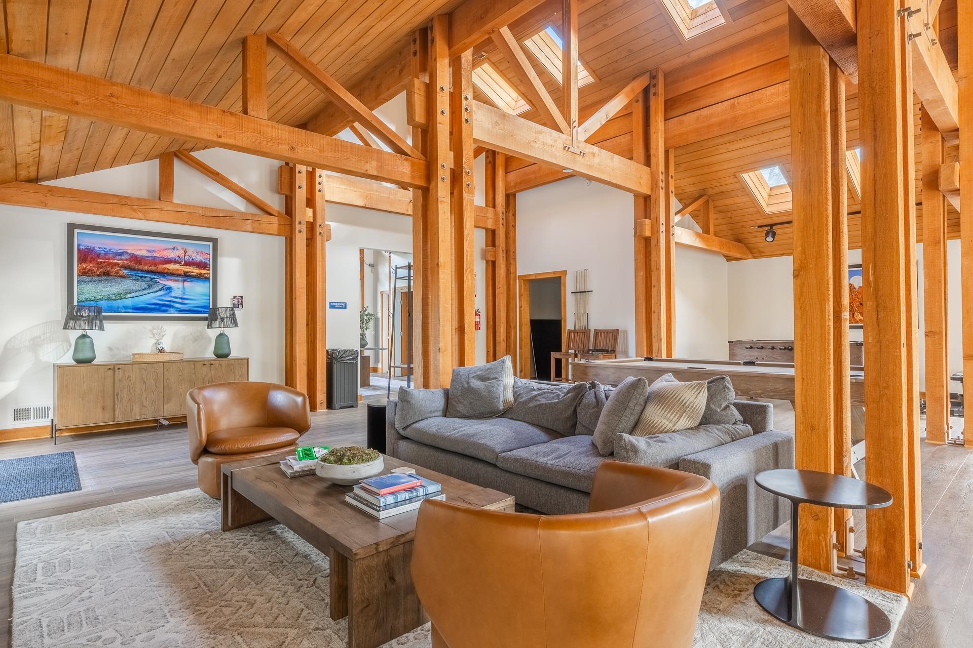 1353 Timber Creek Road, Unit 1353 Mammoth Lakes, CA 93546 - Photo 47 of 50 a living room with furniture and a floor to ceiling window