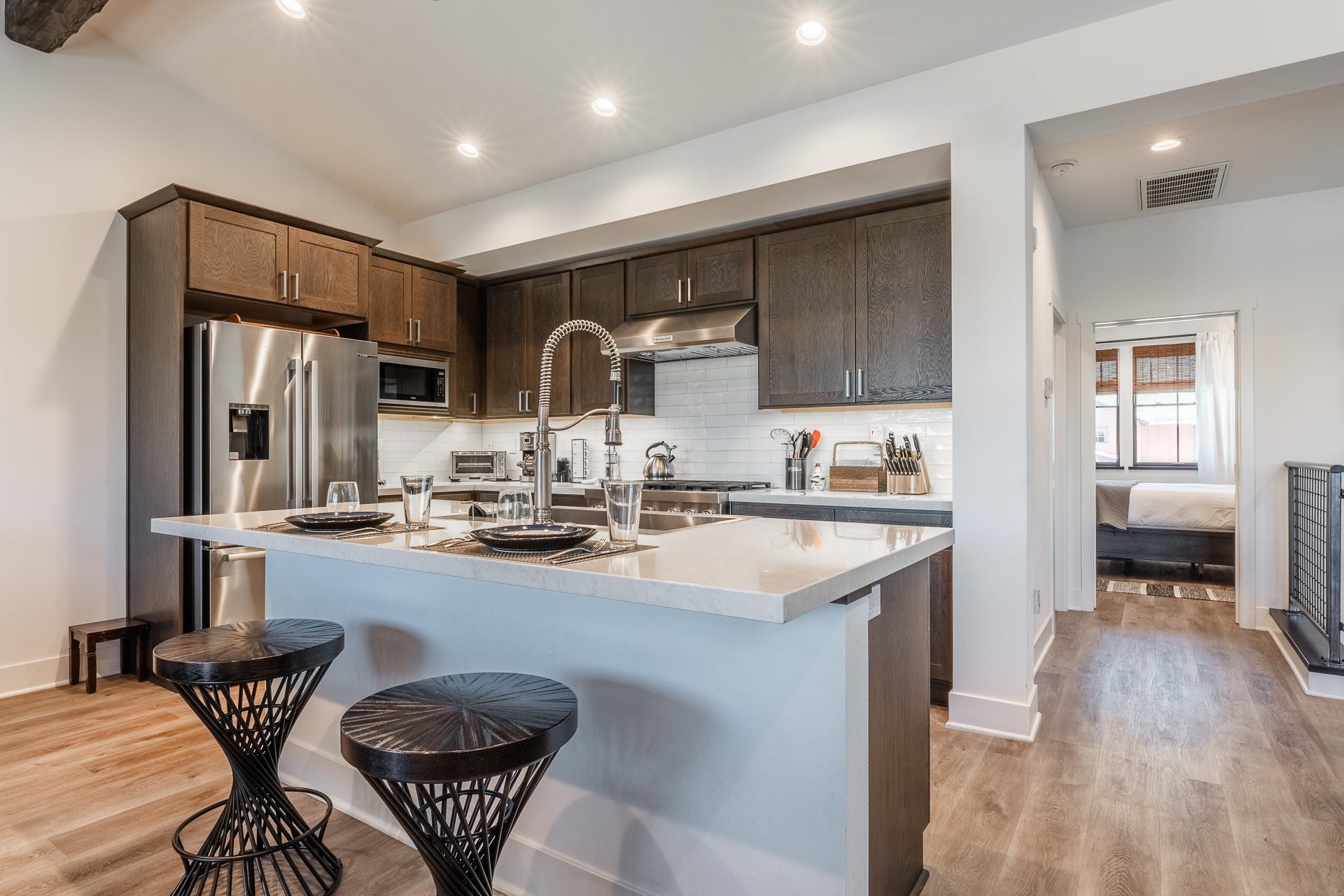 1353 Timber Creek Road, Unit 1353 Mammoth Lakes, CA 93546 - Photo 6 of 50 a kitchen with furniture a sink and a refrigerator