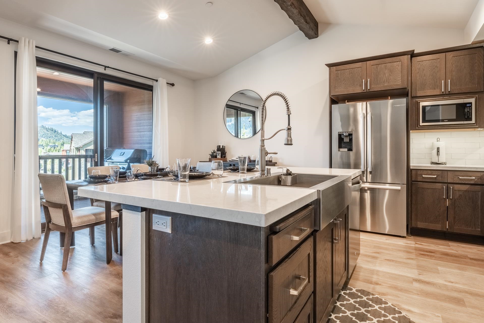 1353 Timber Creek Road, Unit 1353 Mammoth Lakes, CA 93546 - Photo 7 of 50 a kitchen with kitchen island granite countertop a sink appliances and cabinets