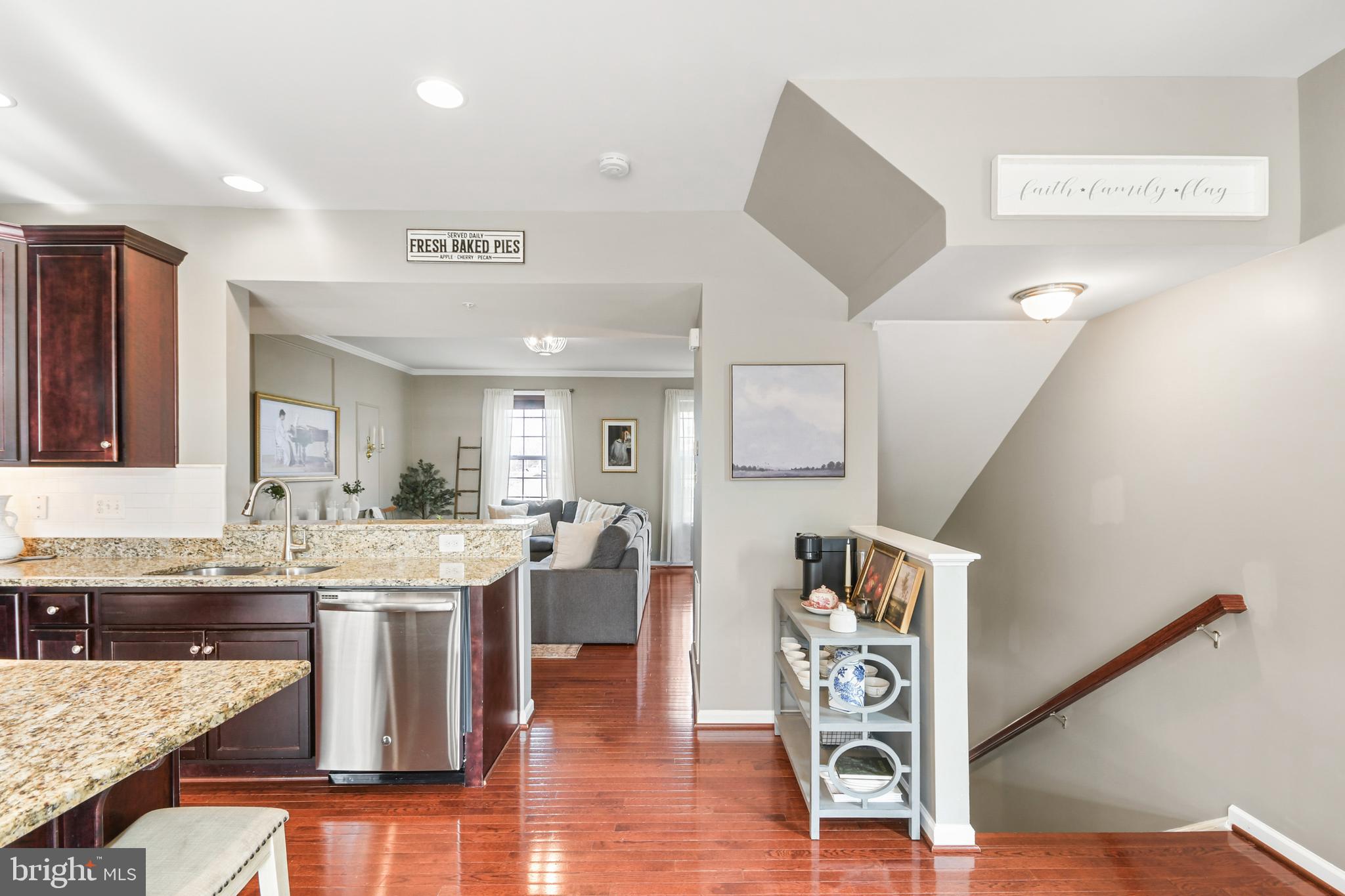 2709 Osprey Way North Frederick, MD 21701 - Photo 19 of 29 a kitchen with stainless steel appliances granite countertop a sink and stove top oven