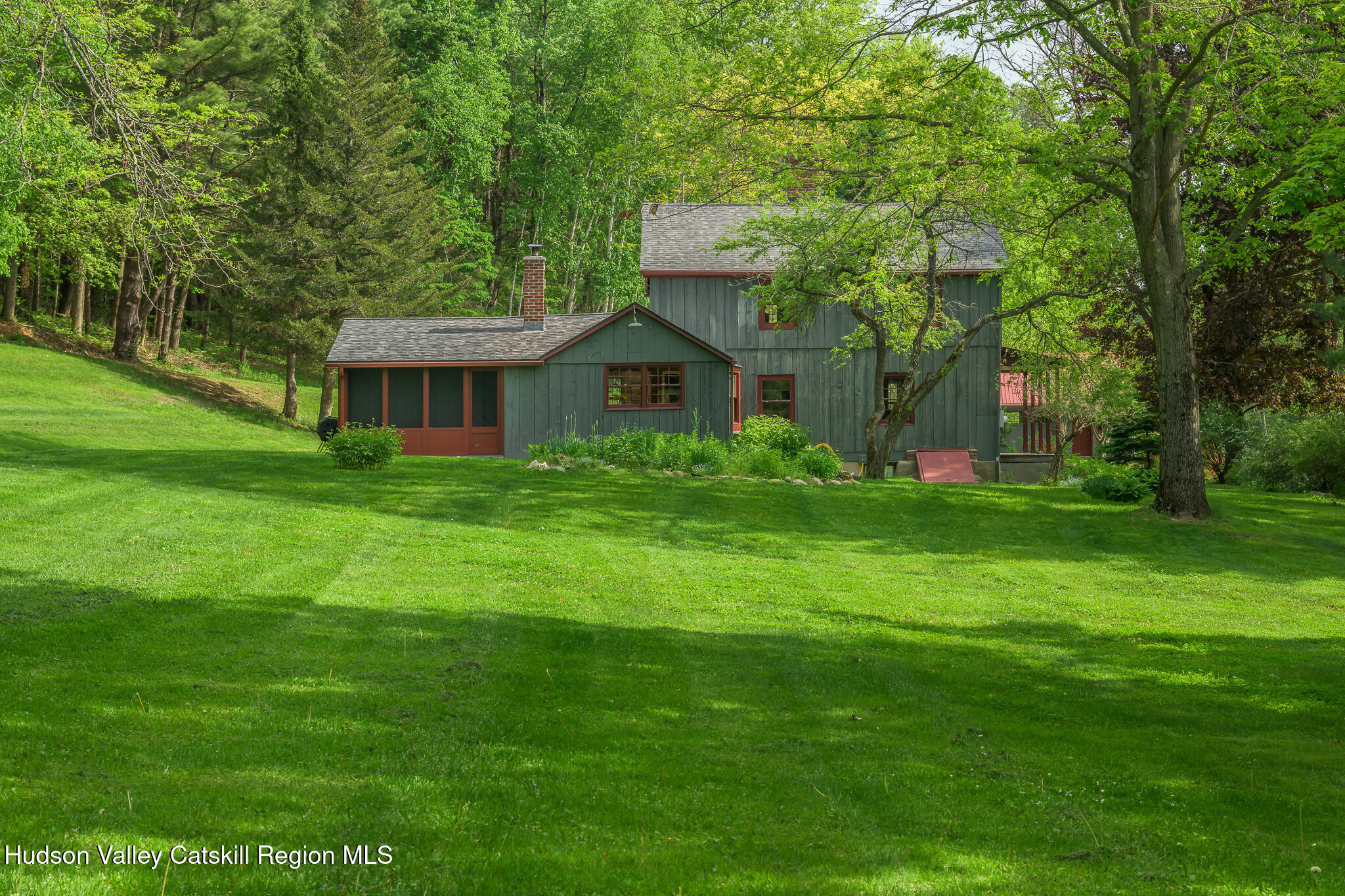 1963 County Rte 5 Canaan, NY 12029 - Photo 42 of 46 a view of a house with a big yard potted plants and large tree