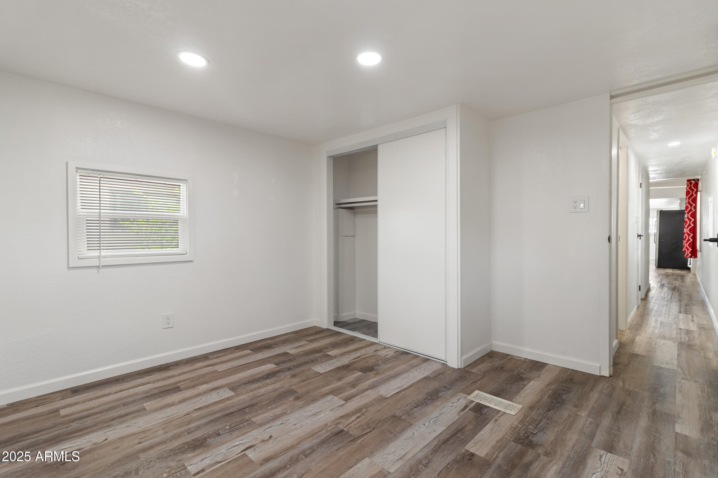 535 South Alma School Road, Unit 17 Mesa, AZ 85210 - Photo 20 of 58 a view of a room with wooden floor and window