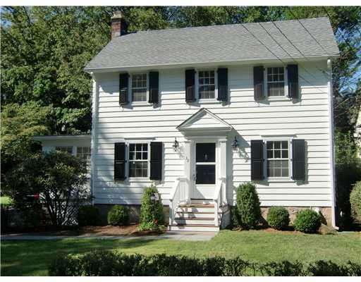 32 Sinawoy Road Cos Cob, CT 06807 - Photo 1 of 10 a front view of a house with a yard