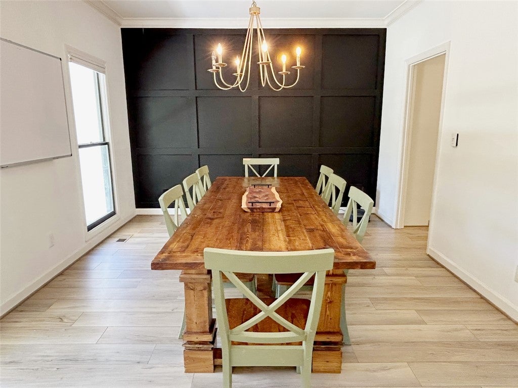 2004 Moores Mill Road Lanett, AL 36863 - Photo 17 of 50 This bright dining area features a unique accent wall and ample natural light.