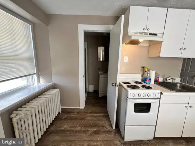 a bathroom with a toilet and a sink