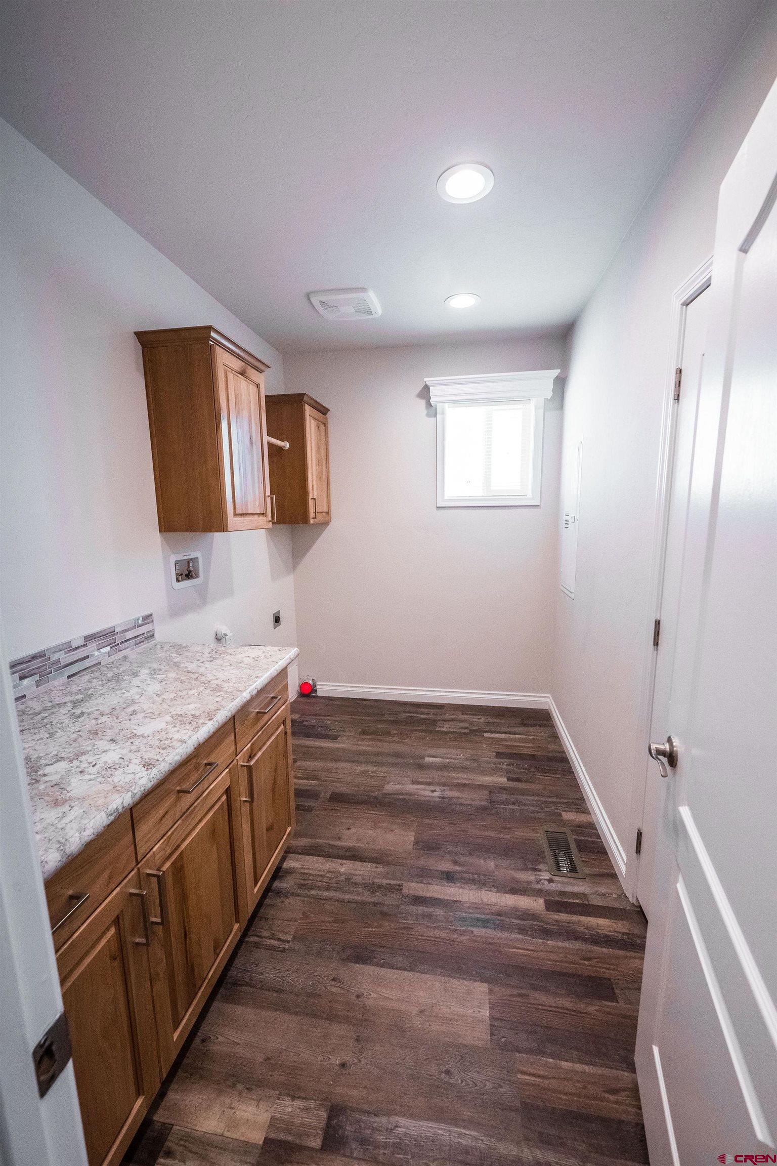 1246 H25 Road Delta, CO 81416 - Photo 17 of 31 a bathroom with a sink and a mirror
