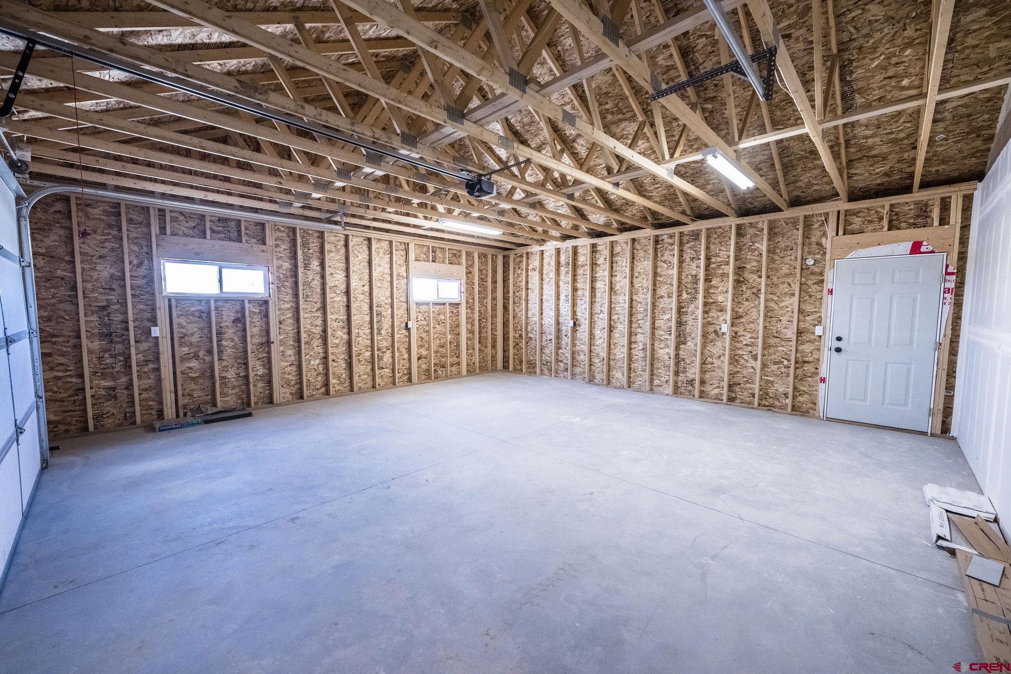 1246 H25 Road Delta, CO 81416 - Photo 18 of 31 a view of an empty room with a garage