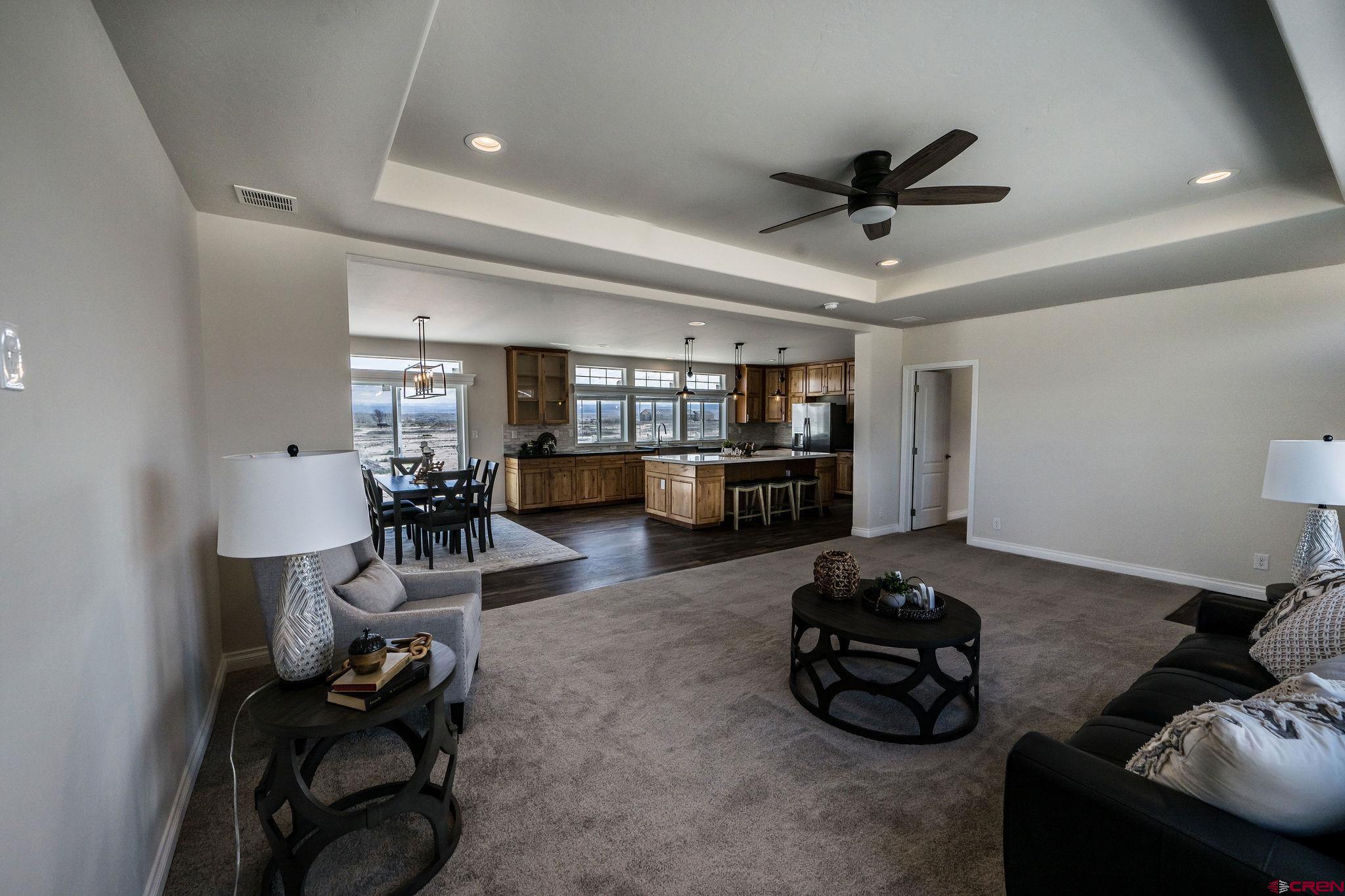 1246 H25 Road Delta, CO 81416 - Photo 2 of 31 a living room with furniture and a gym machine