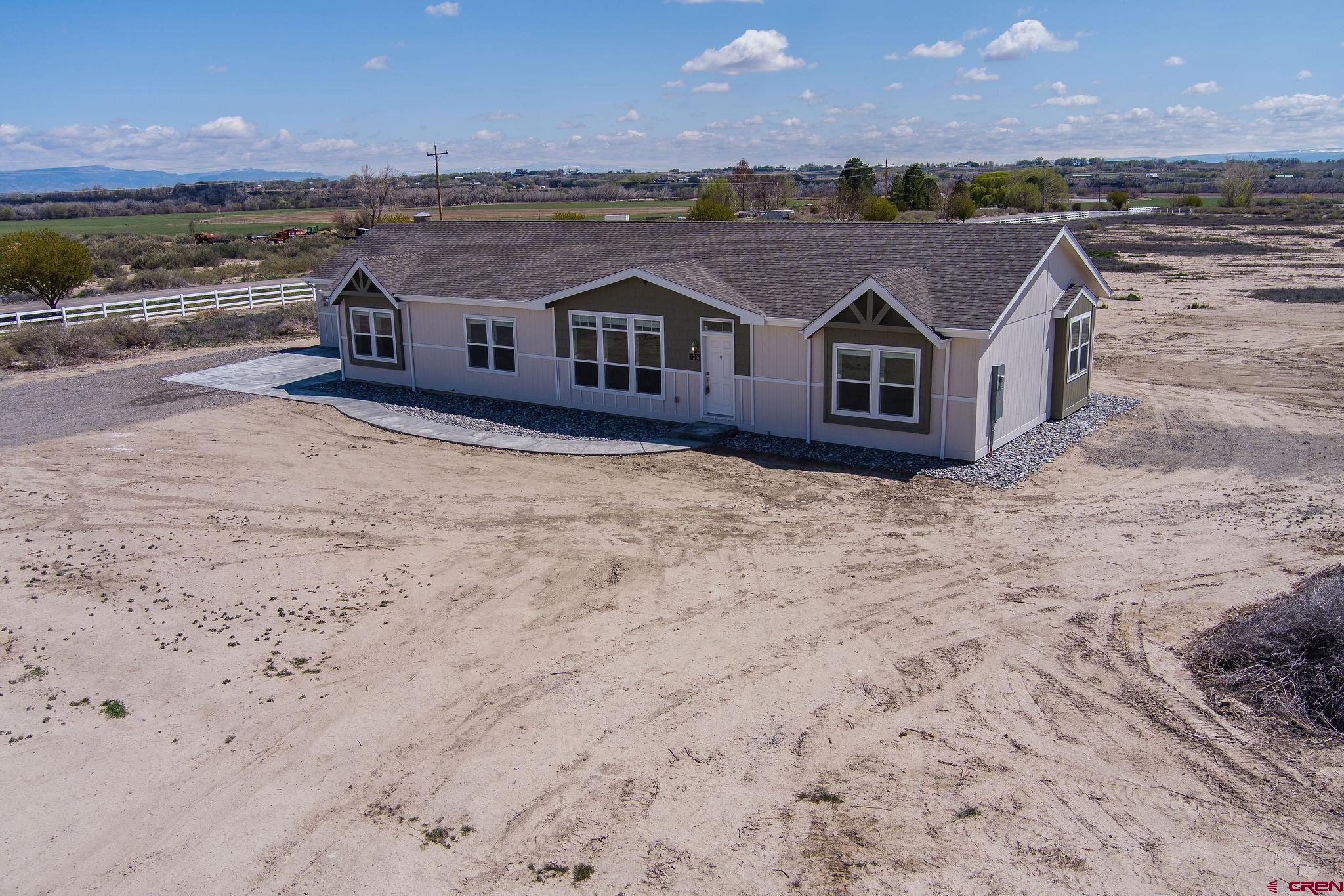 1246 H25 Road Delta, CO 81416 - Photo 21 of 31 an aerial view of residential houses with outdoor space