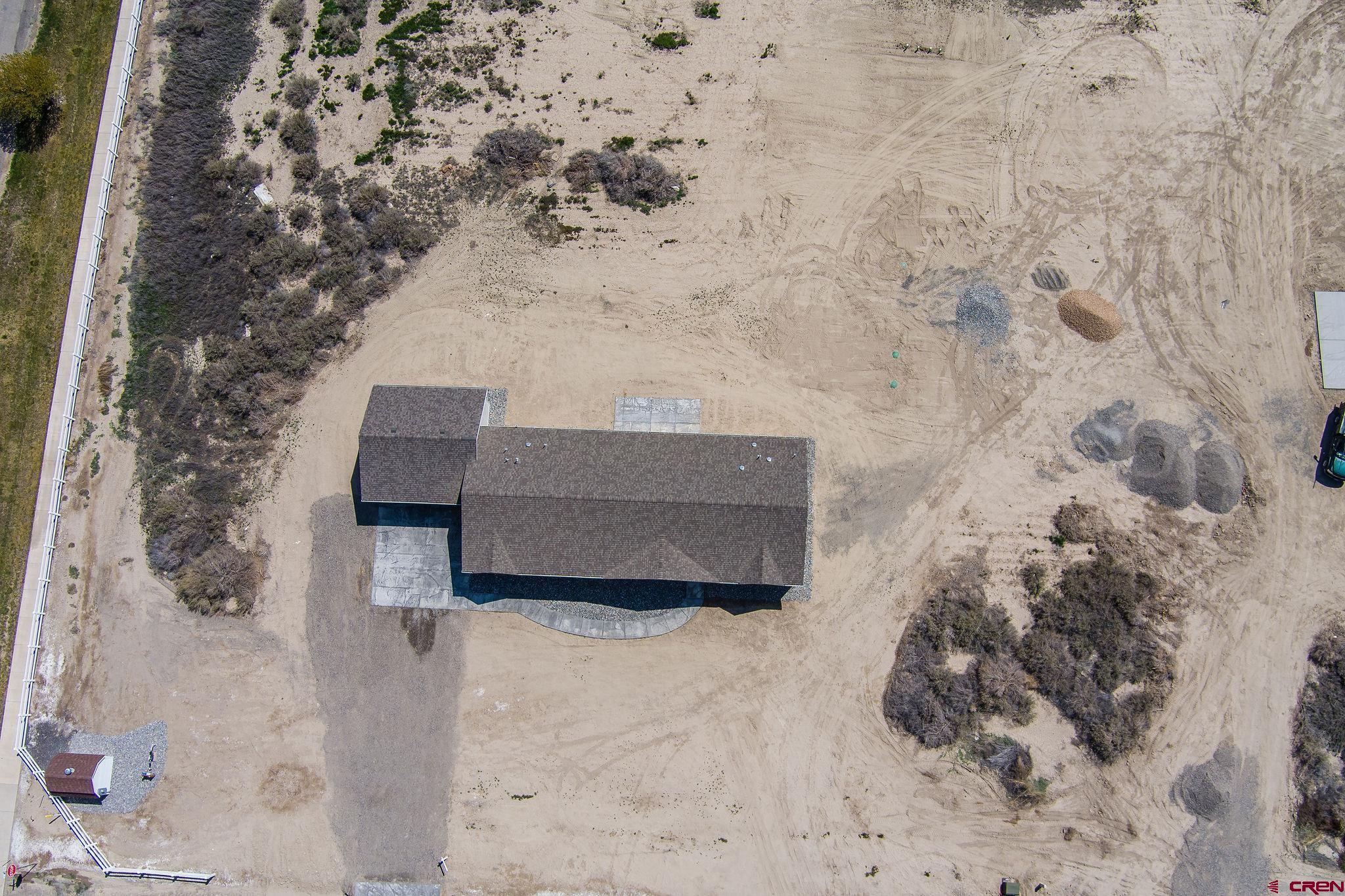 1246 H25 Road Delta, CO 81416 - Photo 29 of 31 a building outdoor space with granite countertop a forest view