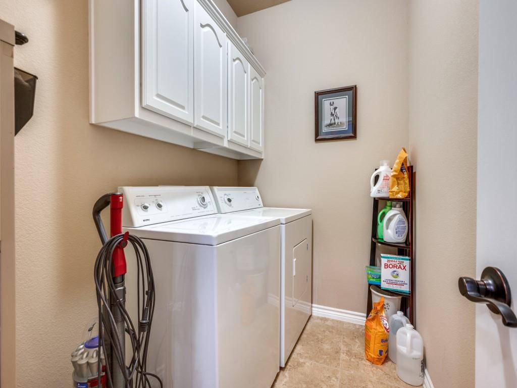 8305 Bishop Pine Road Denton, TX 76208 - Photo 13 of 27 a utility room with dryer and washer