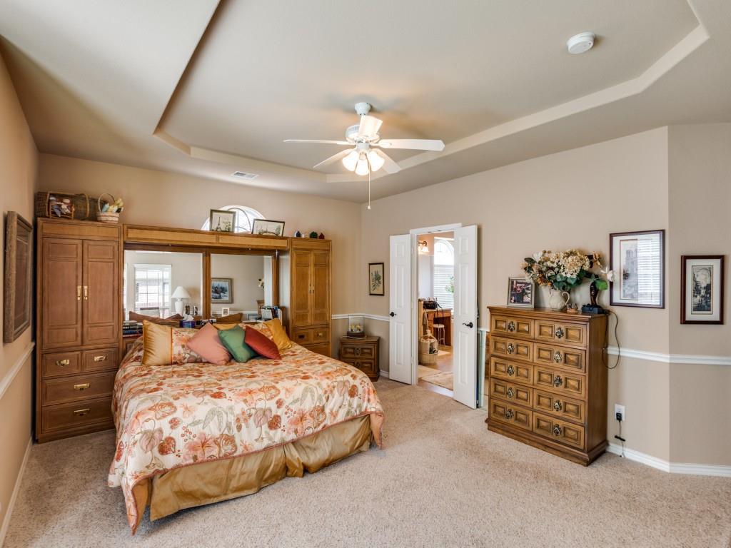 8305 Bishop Pine Road Denton, TX 76208 - Photo 15 of 27 a bedroom with a bed dresser and a window