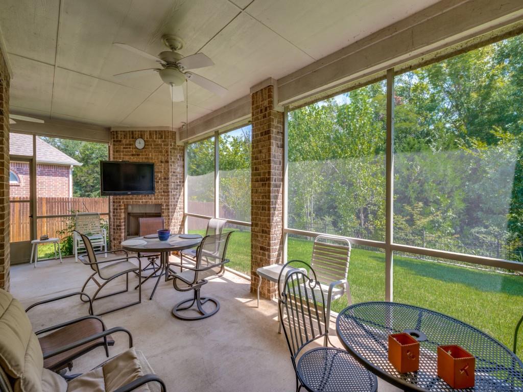 8305 Bishop Pine Road Denton, TX 76208 - Photo 26 of 27 a living room with furniture tv and a large window