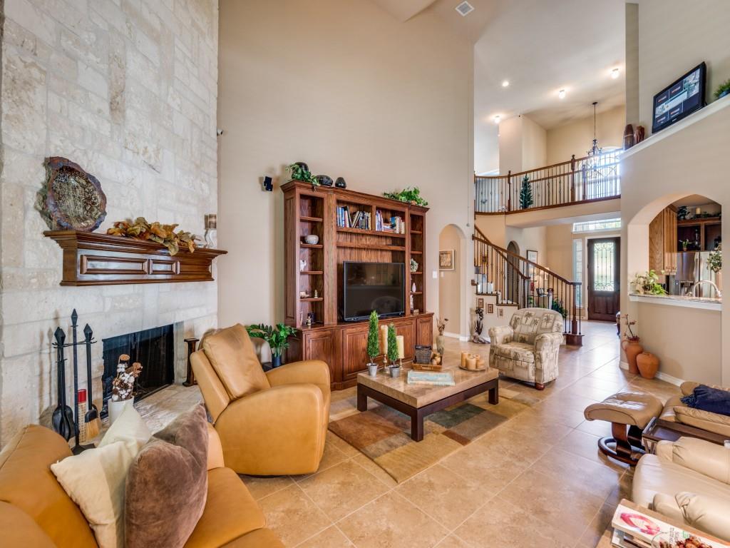 8305 Bishop Pine Road Denton, TX 76208 - Photo 7 of 27 a living room with fireplace furniture and a fireplace