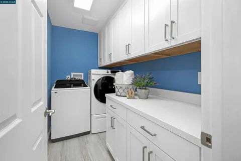 a bedroom with a bed and a ceiling fan