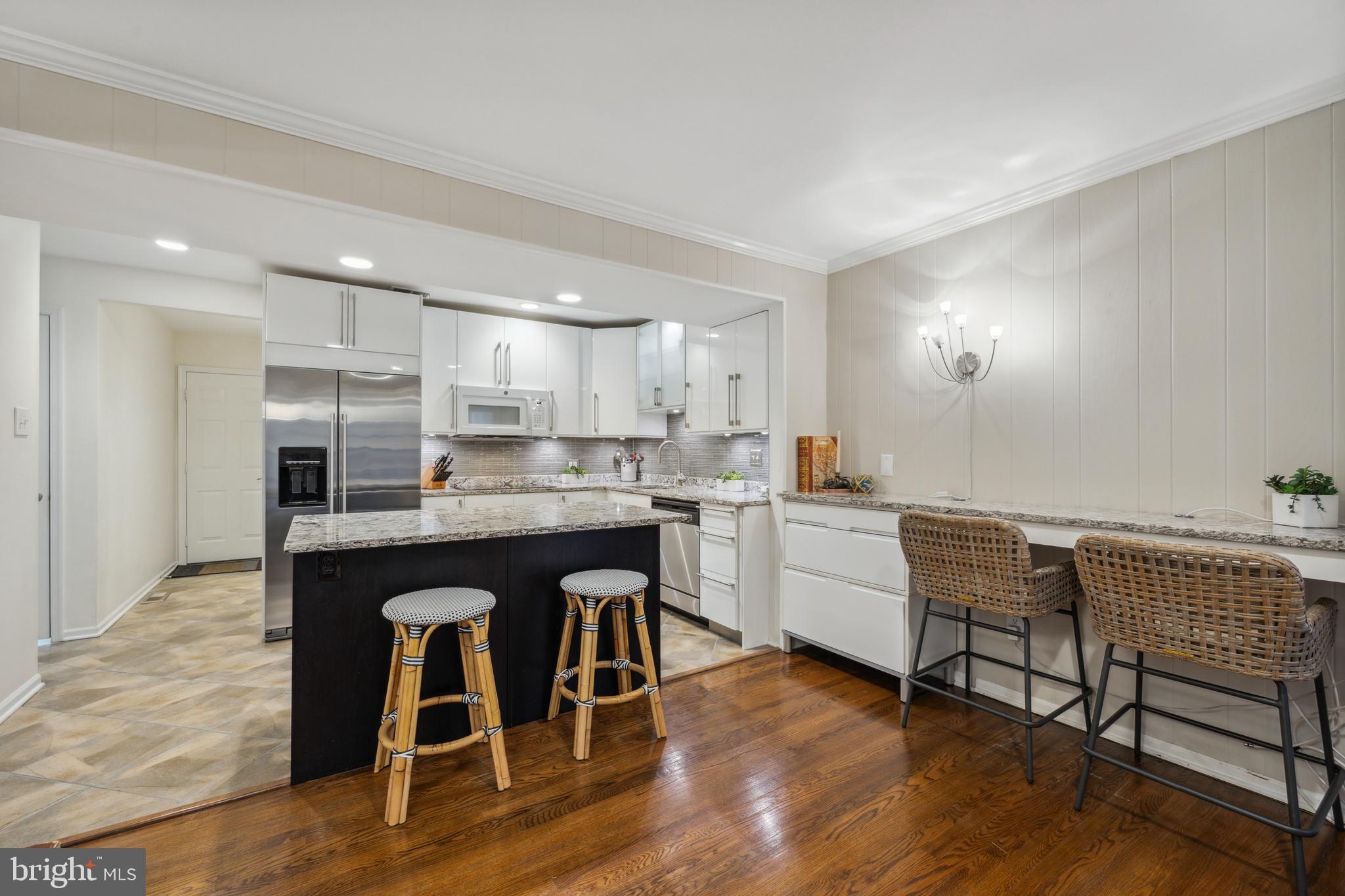 401 Millhouse Pond Chesterbrook, PA 19087 - Photo 5 of 44 Open concept kitchen with built in desk