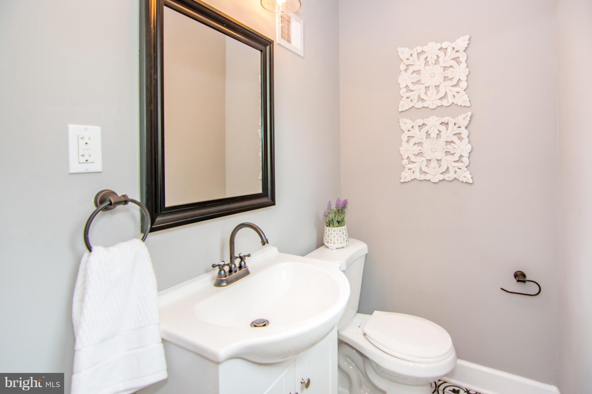 3030 Keswick Road Baltimore, MD 21211 - Photo 14 of 25 Main level half bath