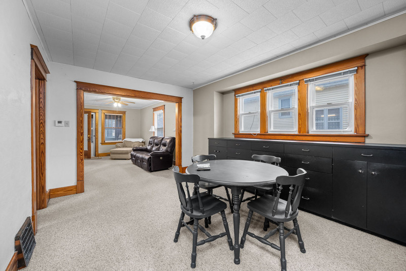 204 Adams Place Clinton, IA 52732 - Photo 13 of 20 a view of a dining room with furniture window and outside view