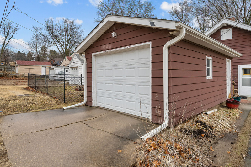 204 Adams Place Clinton, IA 52732 - Photo 5 of 20 a view of a house with a yard