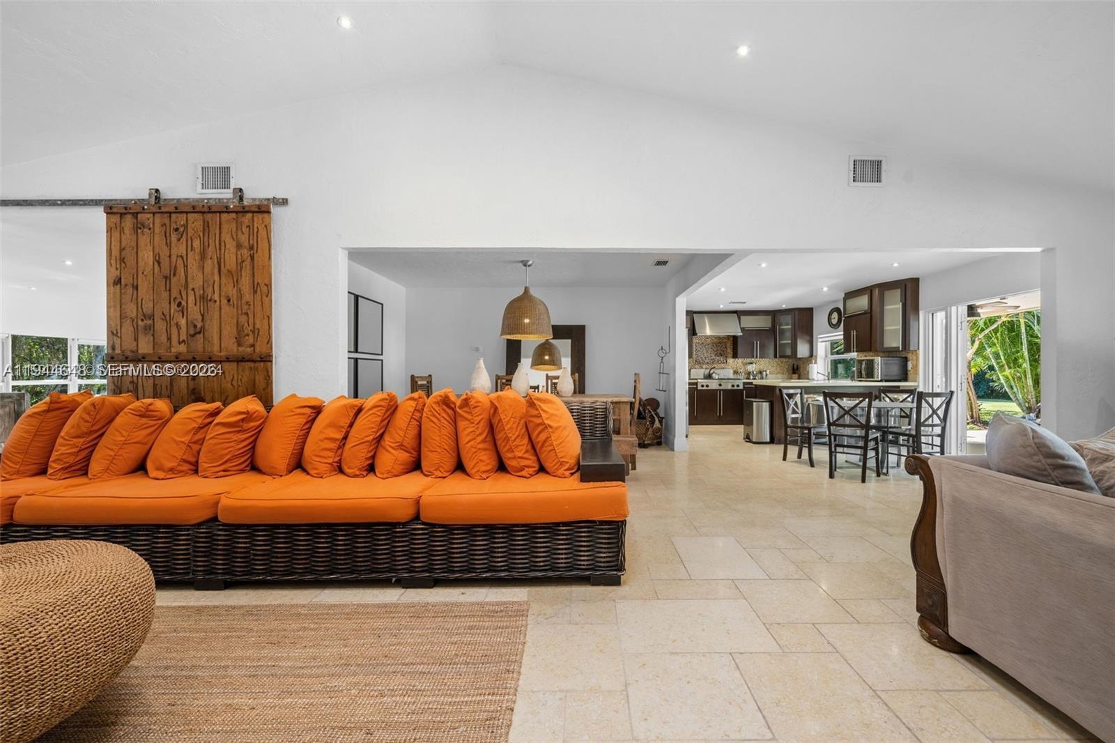 6411 Southwest 185th Way Southwest Ranches, FL 33332 - Photo 12 of 32 a bedroom with a large bed and ceiling fan