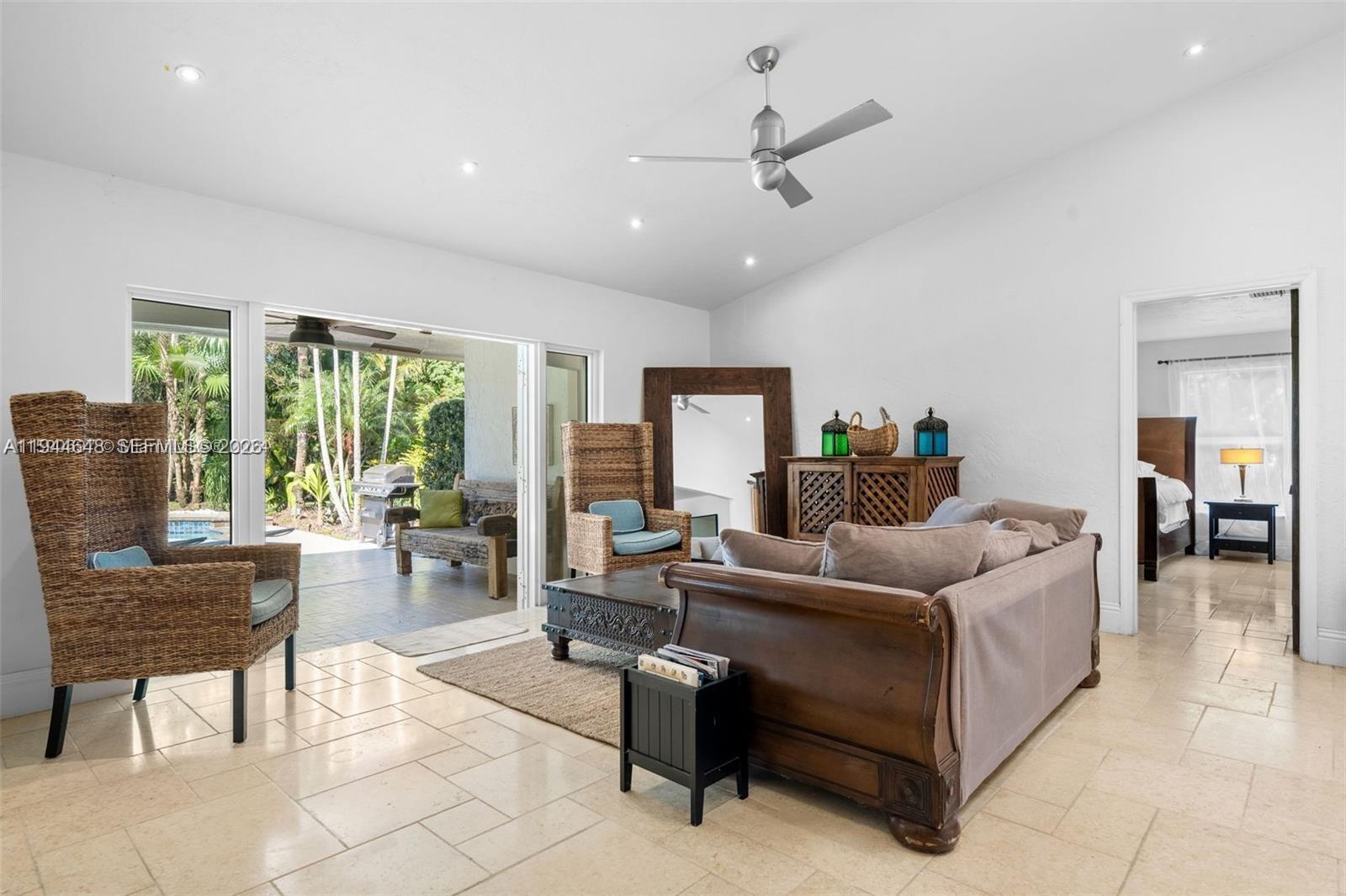 6411 Southwest 185th Way Southwest Ranches, FL 33332 - Photo 13 of 32 a living room with furniture and a large window
