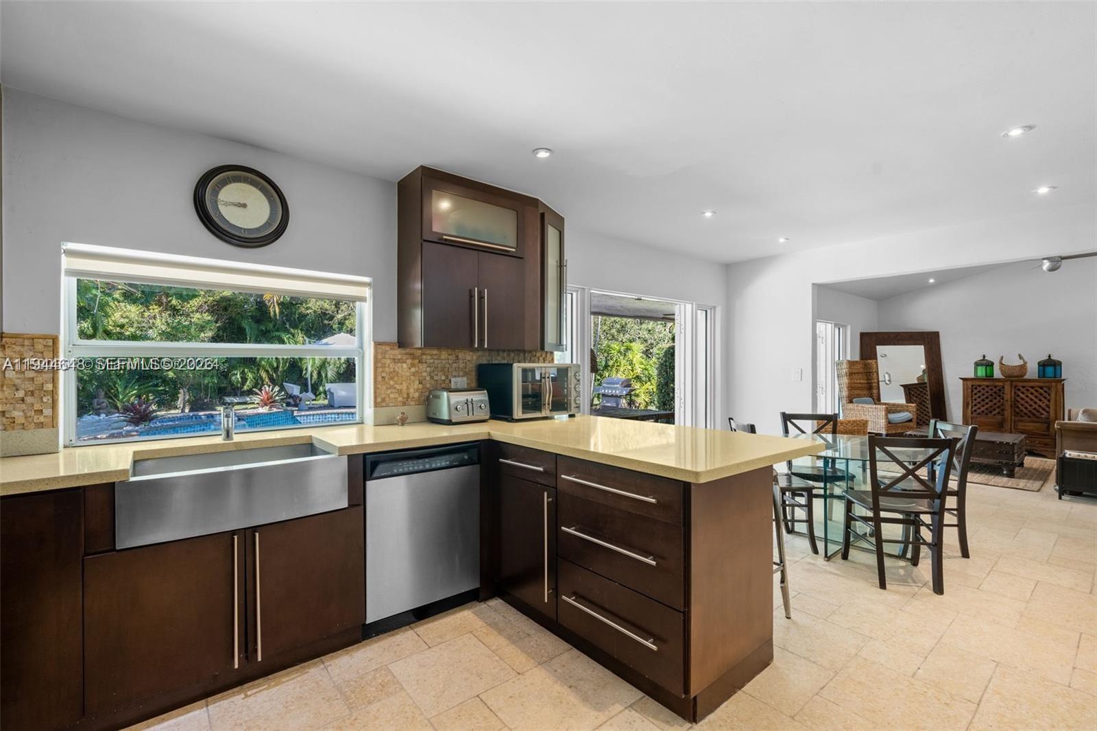 6411 Southwest 185th Way Southwest Ranches, FL 33332 - Photo 17 of 32 a kitchen with lots of counter top space and furniture