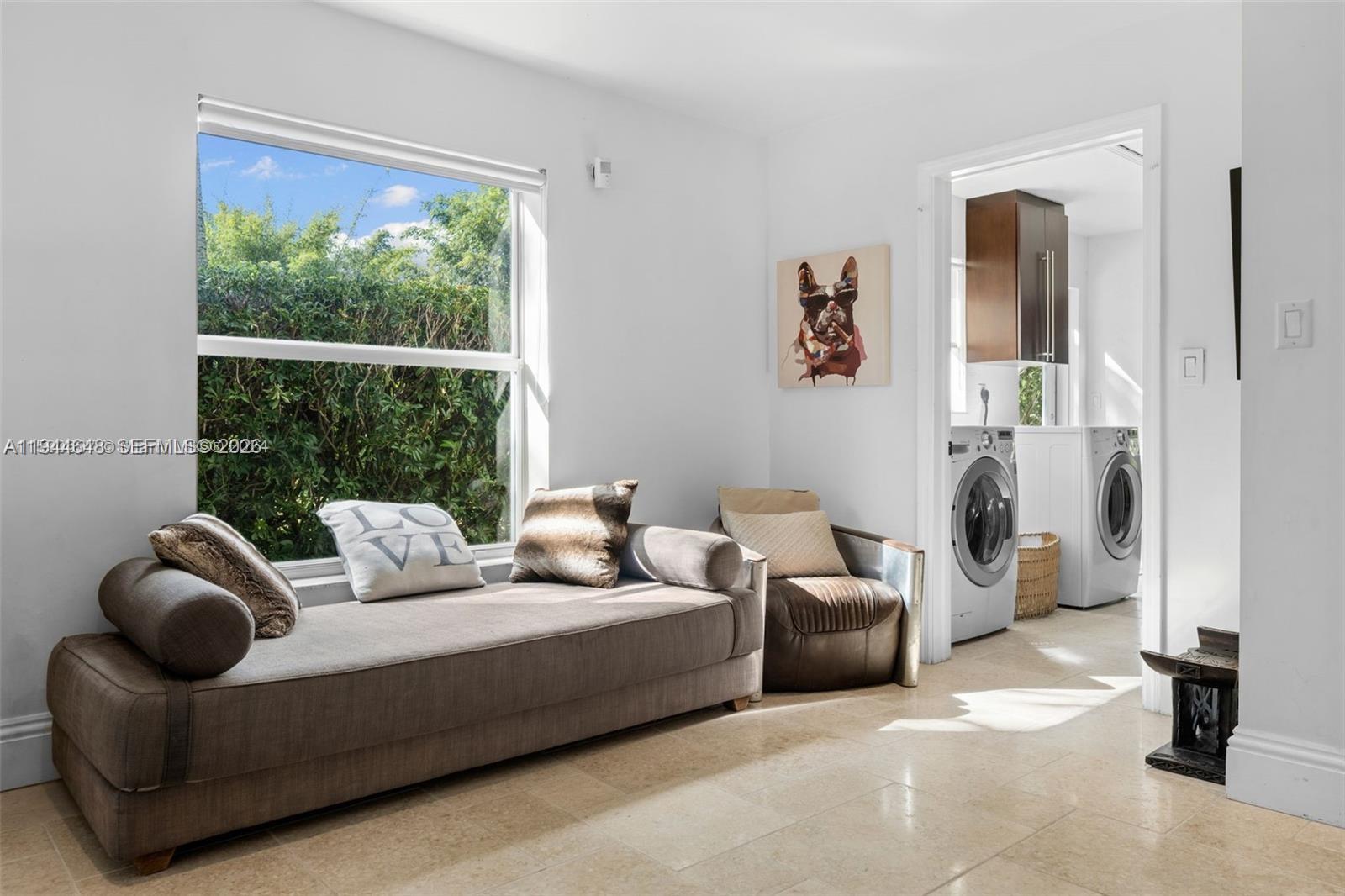 6411 Southwest 185th Way Southwest Ranches, FL 33332 - Photo 19 of 32 a living room with furniture and a large window