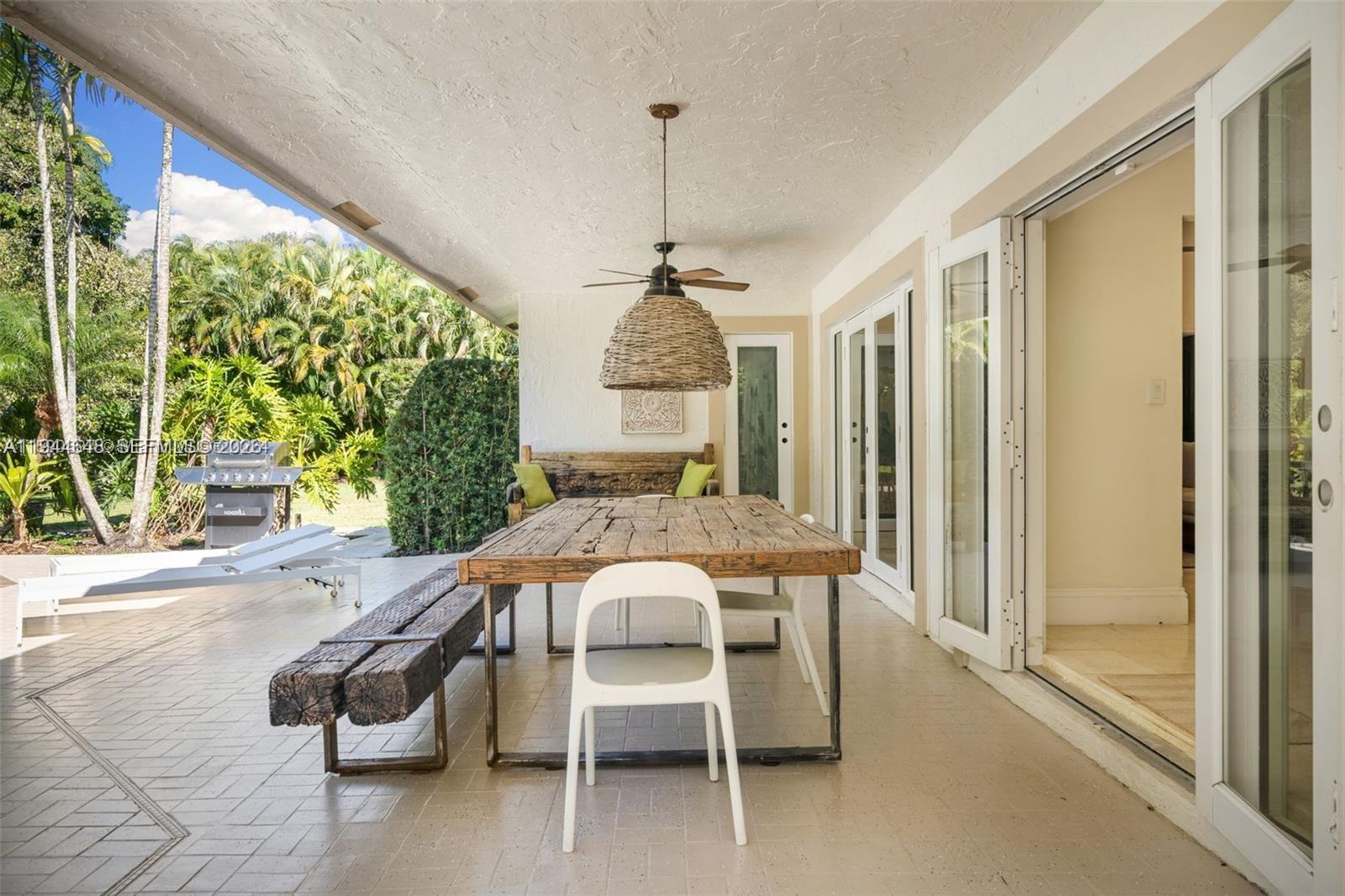 6411 Southwest 185th Way Southwest Ranches, FL 33332 - Photo 29 of 32 a dining room with furniture and window