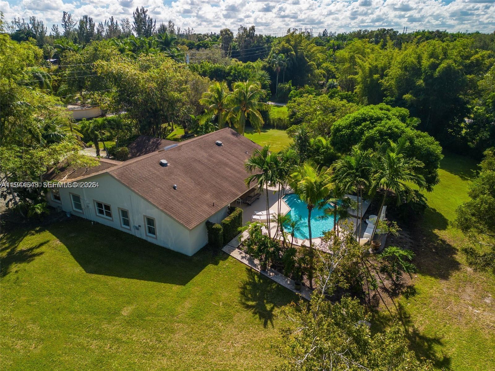 6411 Southwest 185th Way Southwest Ranches, FL 33332 - Photo 30 of 32 an aerial view of a house with a garden
