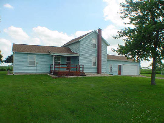 355 Porter Road Harmon, IL 61042 - Photo 1 of 11 a front view of house with yard and green space