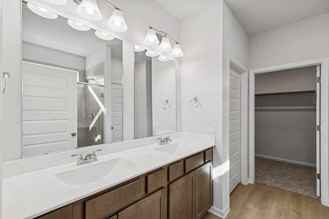 9745 Enclave Ridge Road Willis, TX 77318 - Photo 12 of 27 The Sparrow II- Primary Bath with Dual Vanities