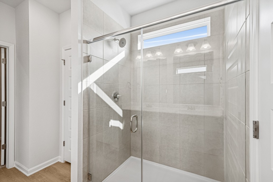 9745 Enclave Ridge Road Willis, TX 77318 - Photo 13 of 27 The Sparrow II- Primary Bath with Walk-In Shower