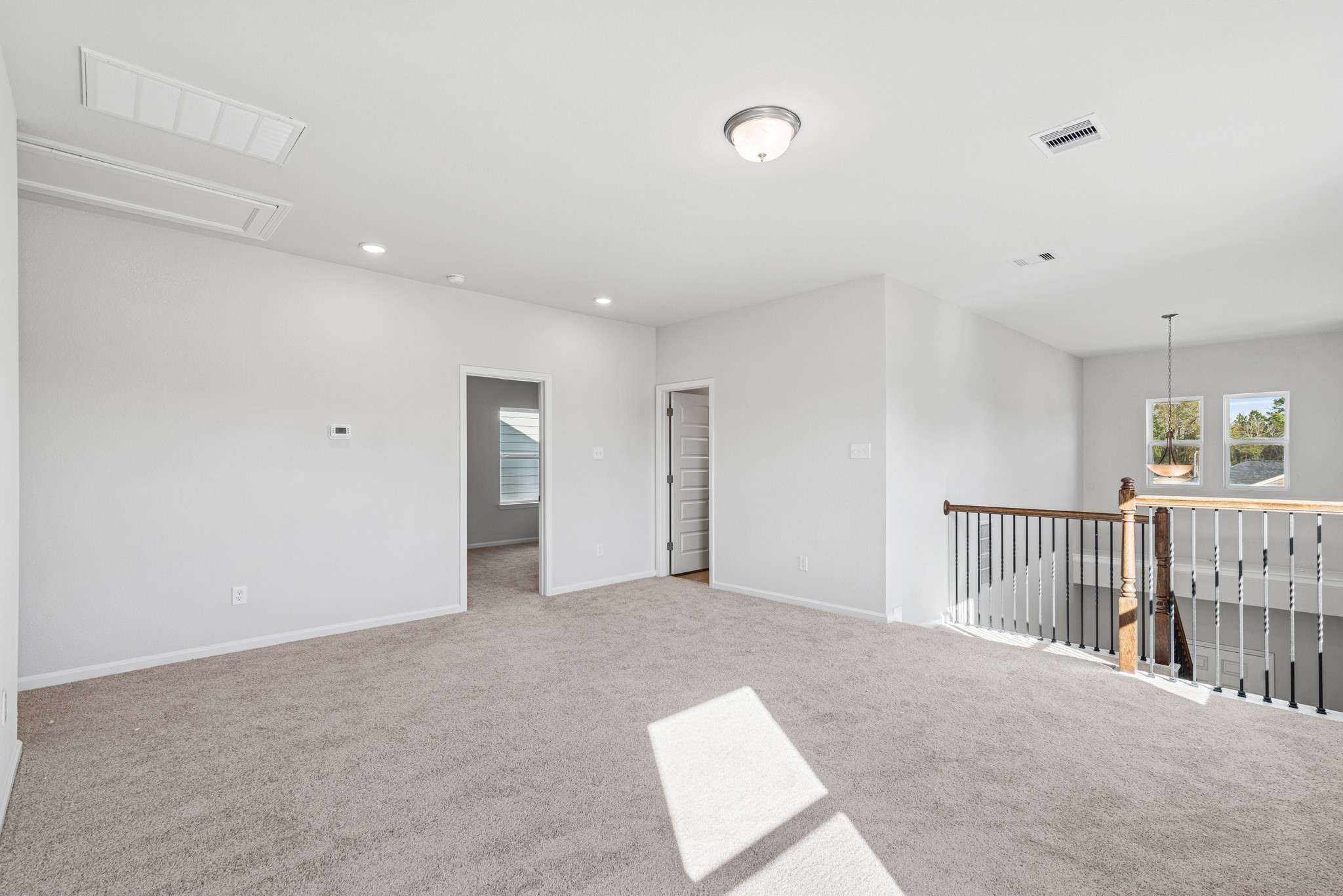 9745 Enclave Ridge Road Willis, TX 77318 - Photo 15 of 27 a view of an empty room