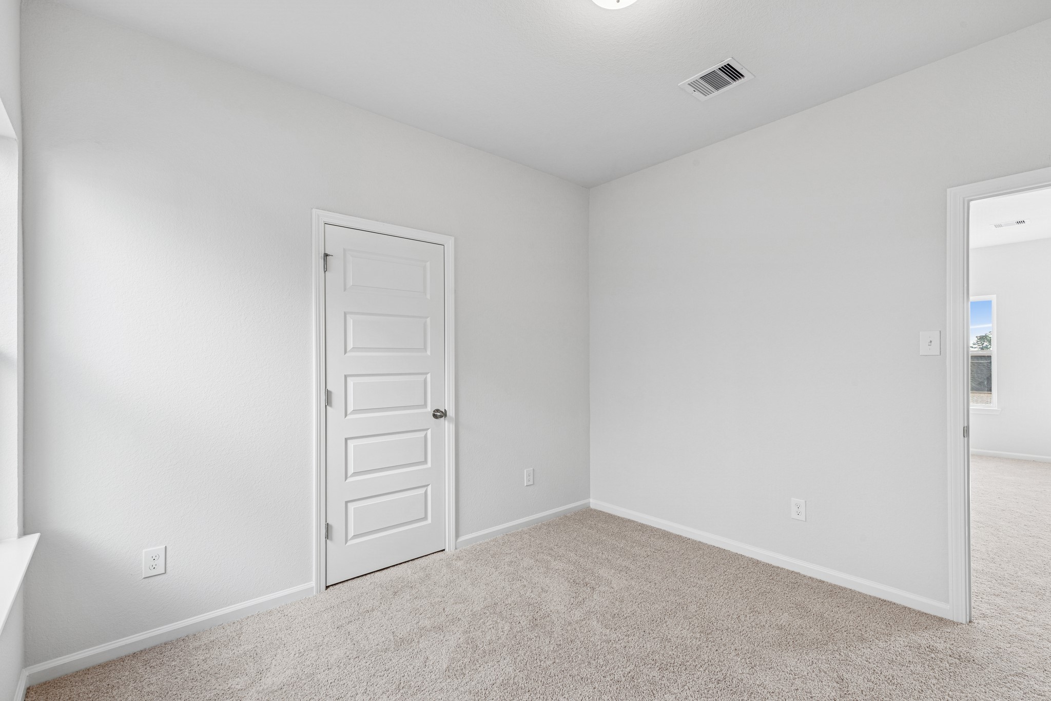 9745 Enclave Ridge Road Willis, TX 77318 - Photo 19 of 27 an empty room with closet